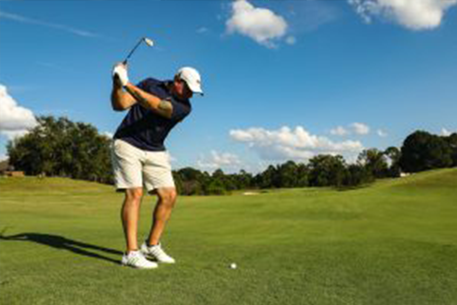 Man playing golf